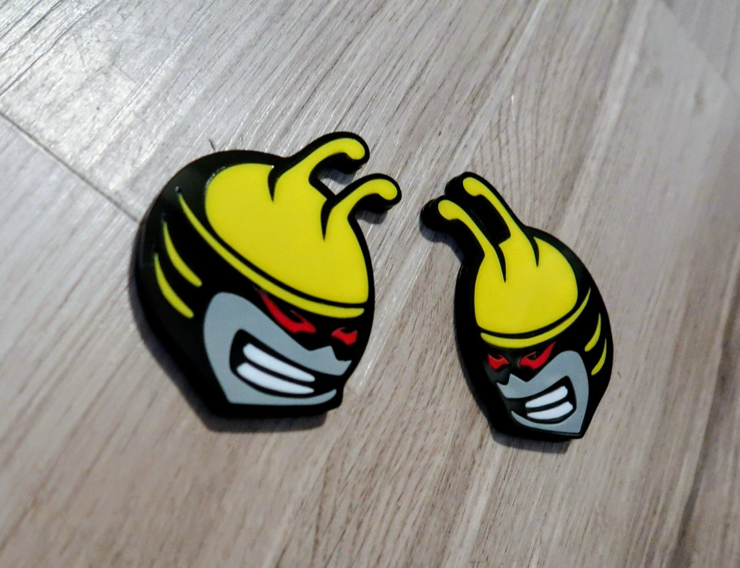 Bee head car badges, 5 color customize-able. 2 included.