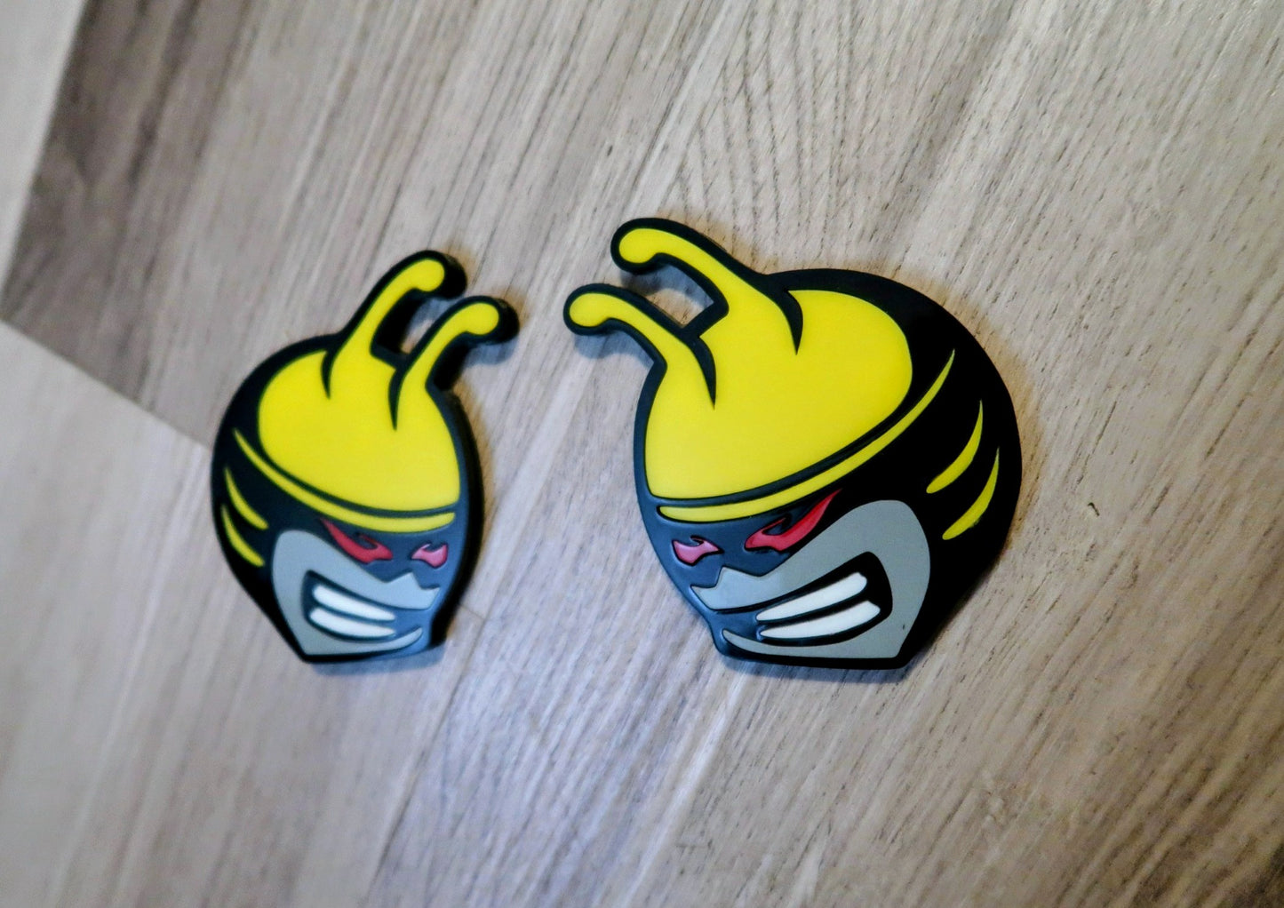 Bee head car badges, 5 color customize-able. 2 included.