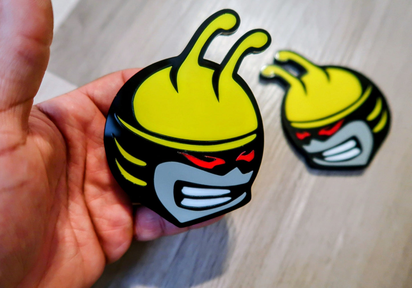 Bee head car badges, 5 color customize-able. 2 included.