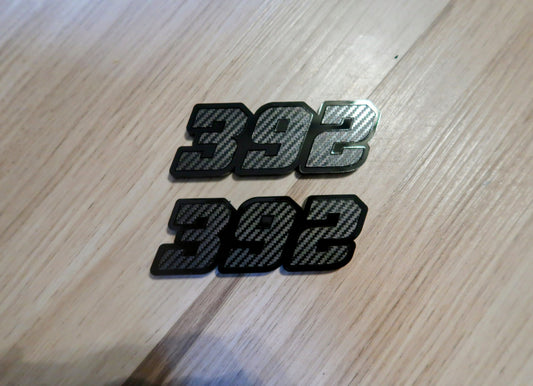 392, or 345, or 426 fender badges. Includes 2.