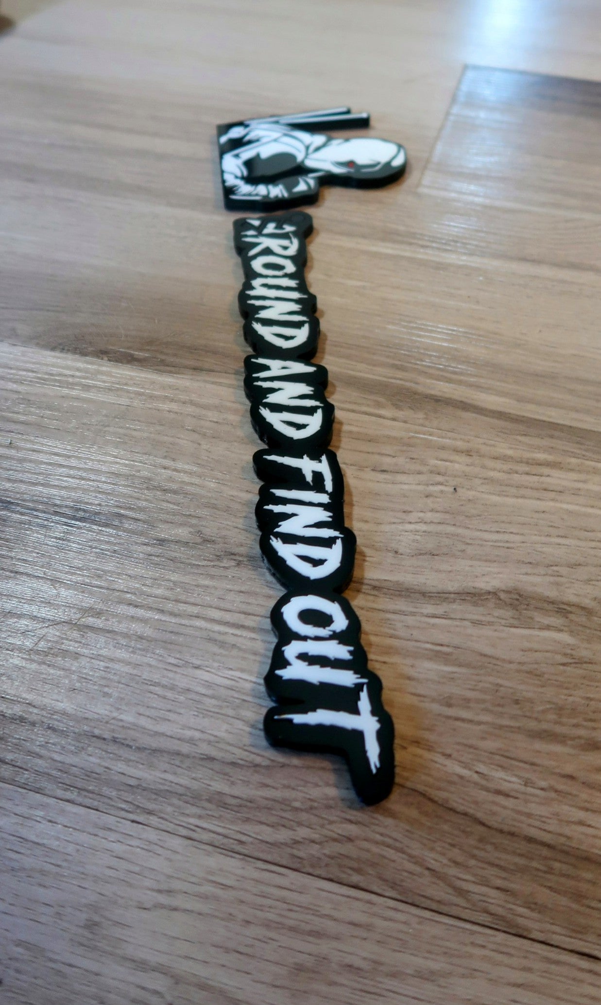 F Around and find out/DP combo badge