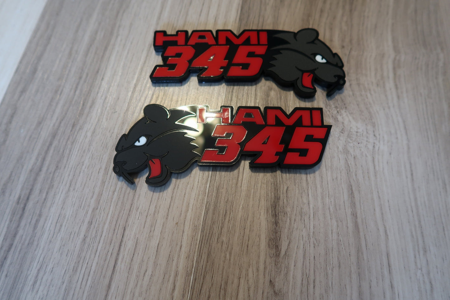 Hami 345, 392, or 396 fender badges. Includes 2.