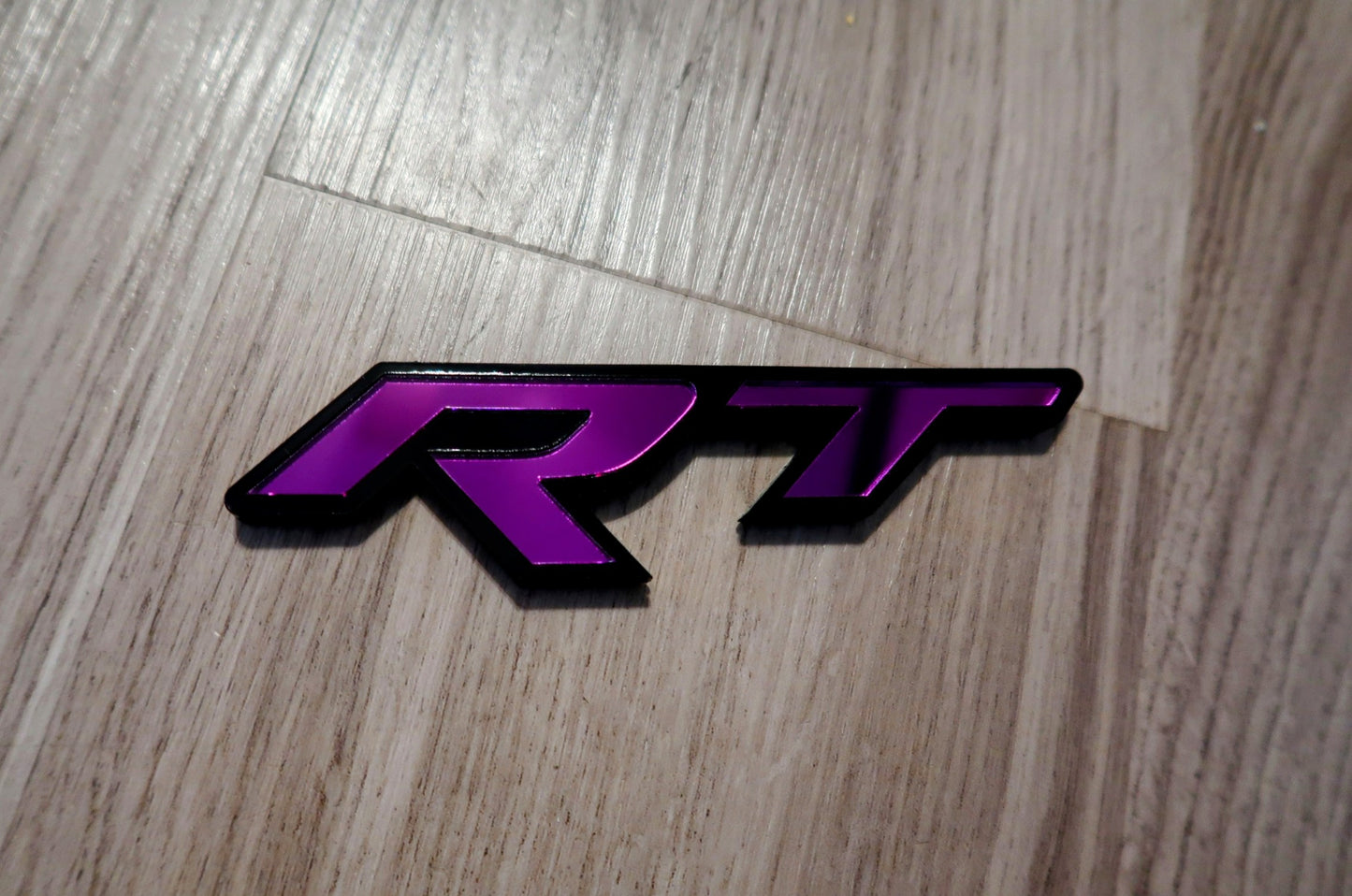 Racetrack badges. Includes 2.