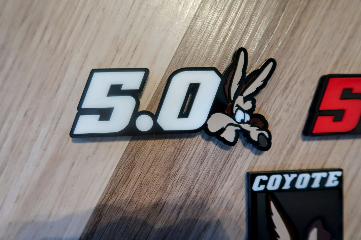 Coyote 5.0 set. With custom text. Includes all 3 badges.