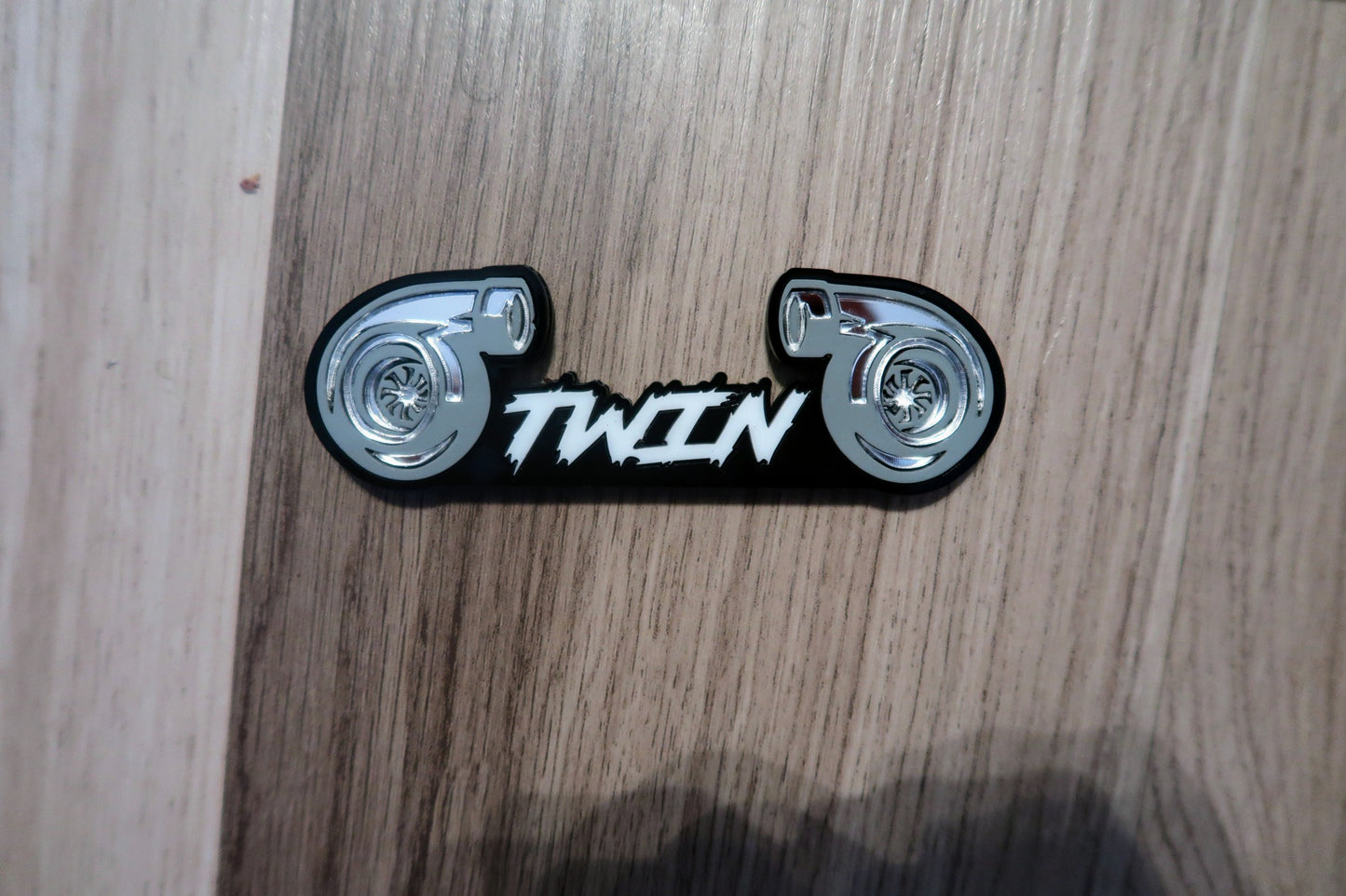 Twin Turbo badge. Includes 1.