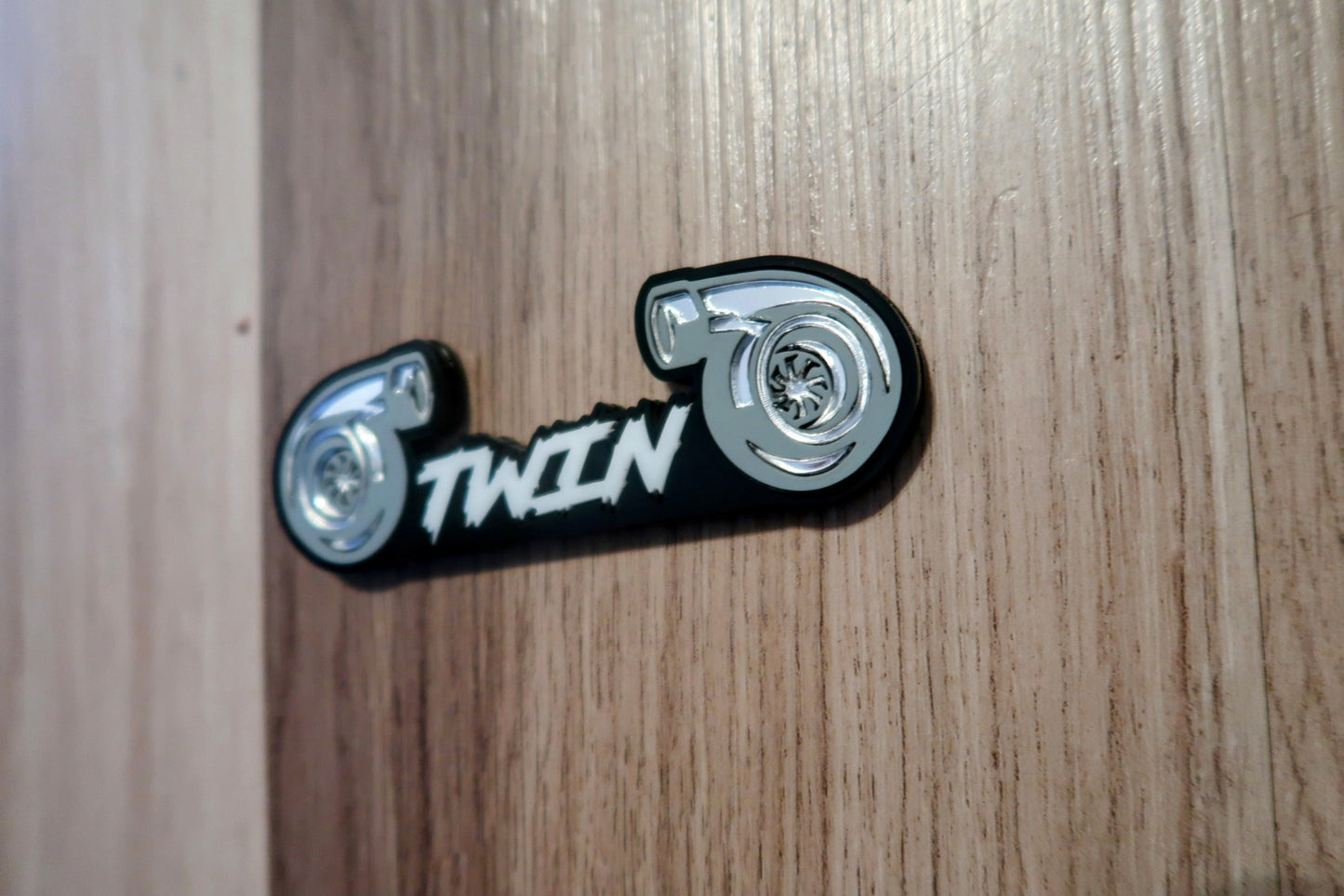Twin Turbo badge. Includes 1.
