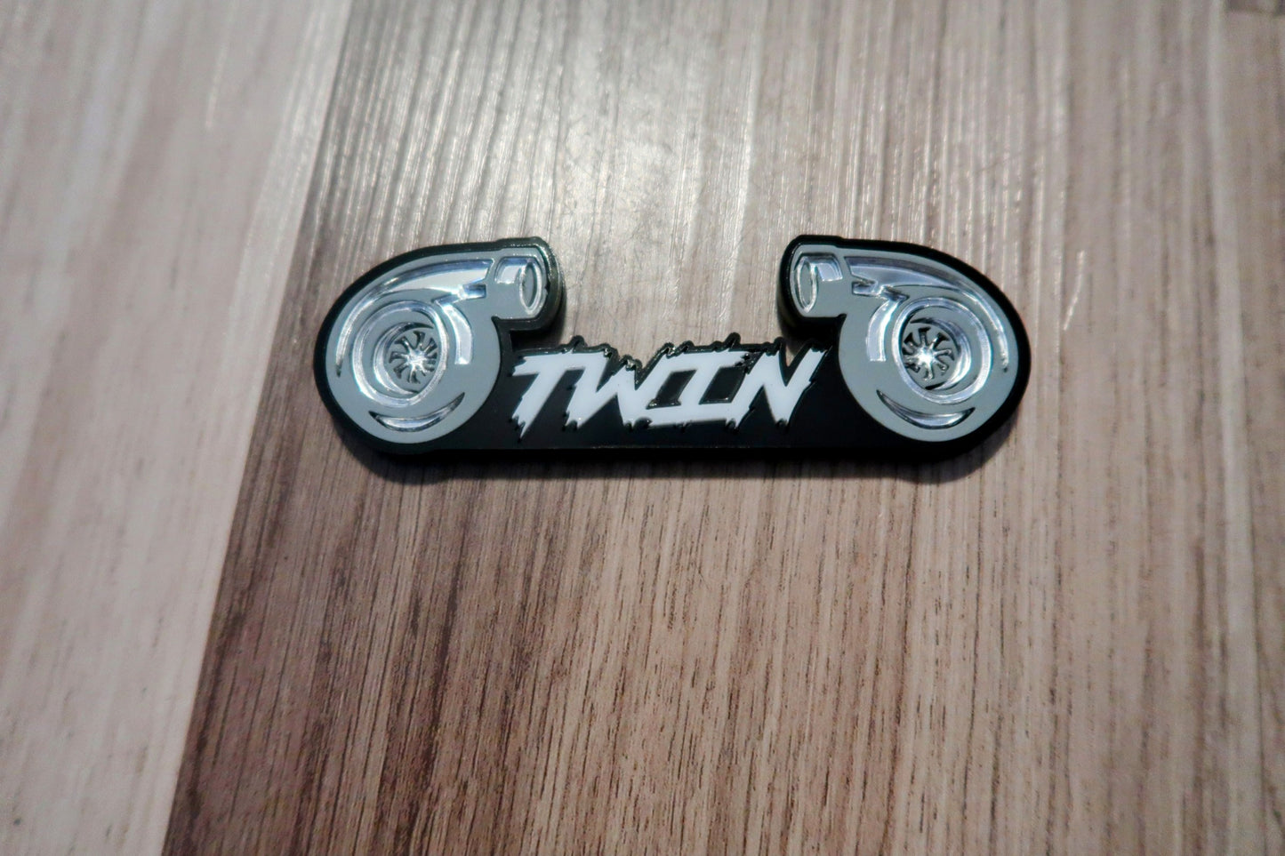 Twin Turbo badge. Includes 1.