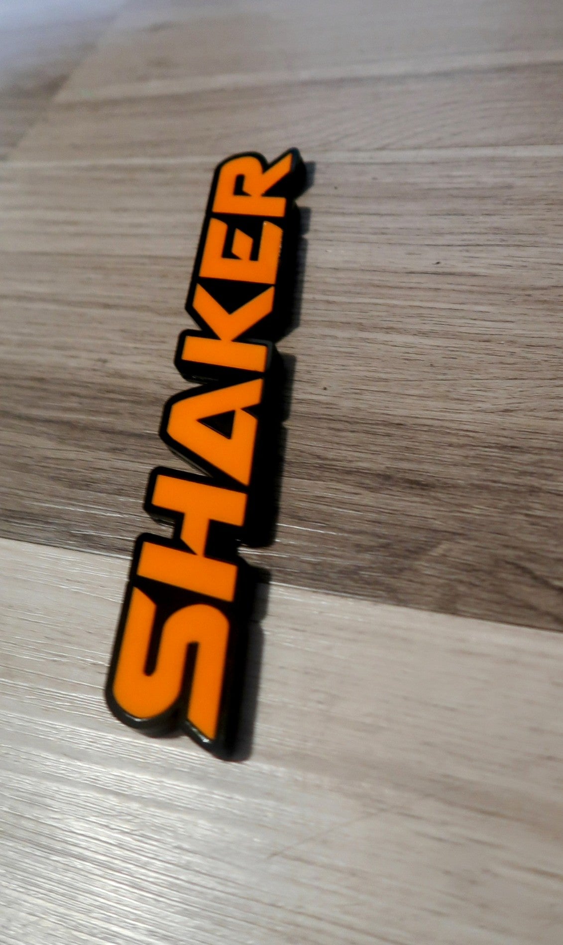 Shaker car badge. Includes 1.