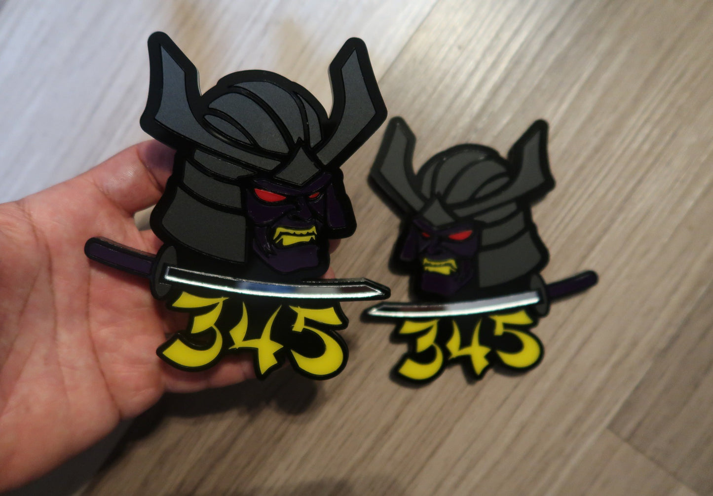 Samurai 345,392, 426 fender badges. Includes 2.