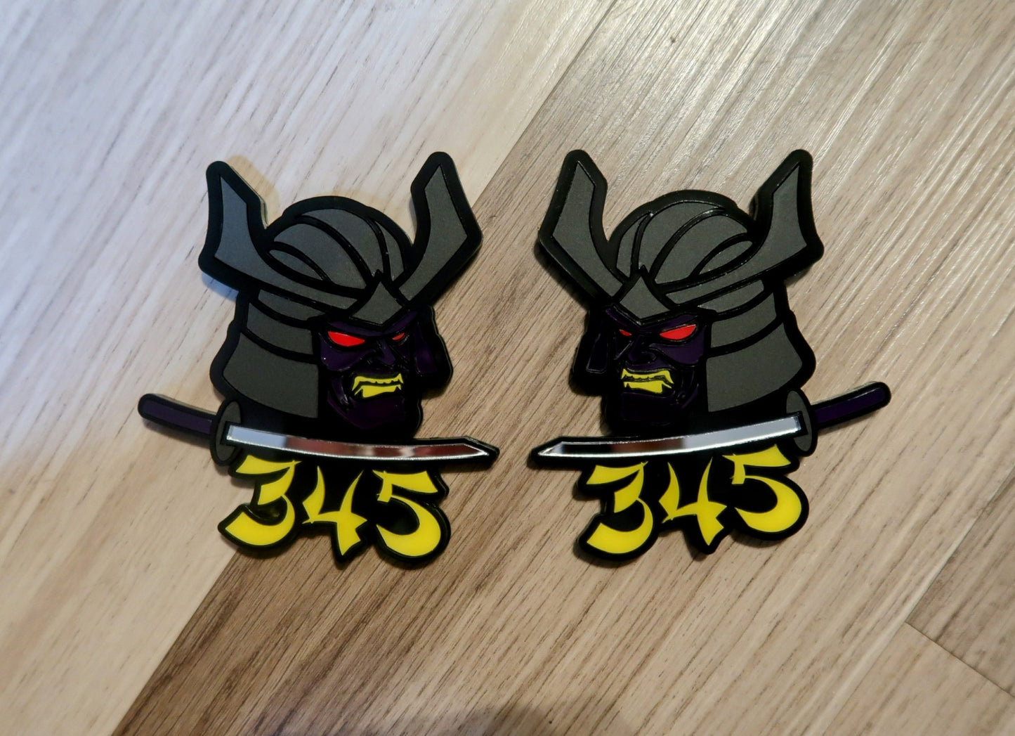 Samurai 345,392, 426 fender badges. Includes 2.