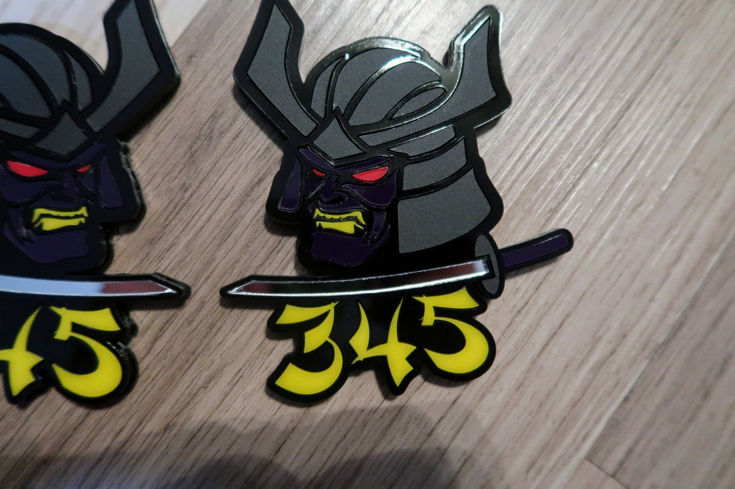 Samurai 345,392, 426 fender badges. Includes 2.