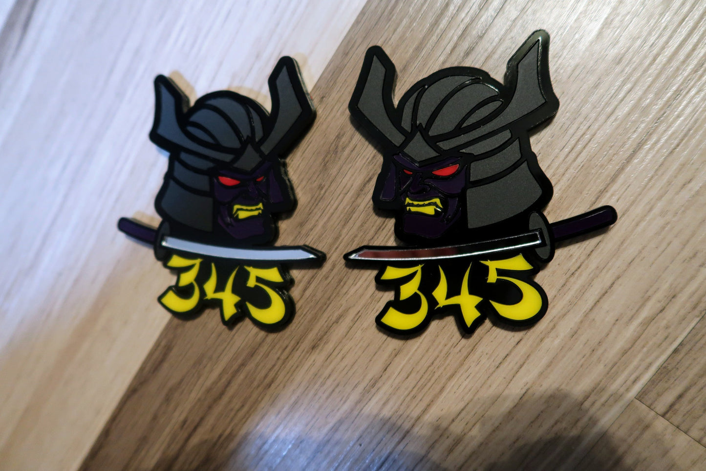 Samurai 345,392, 426 fender badges. Includes 2.
