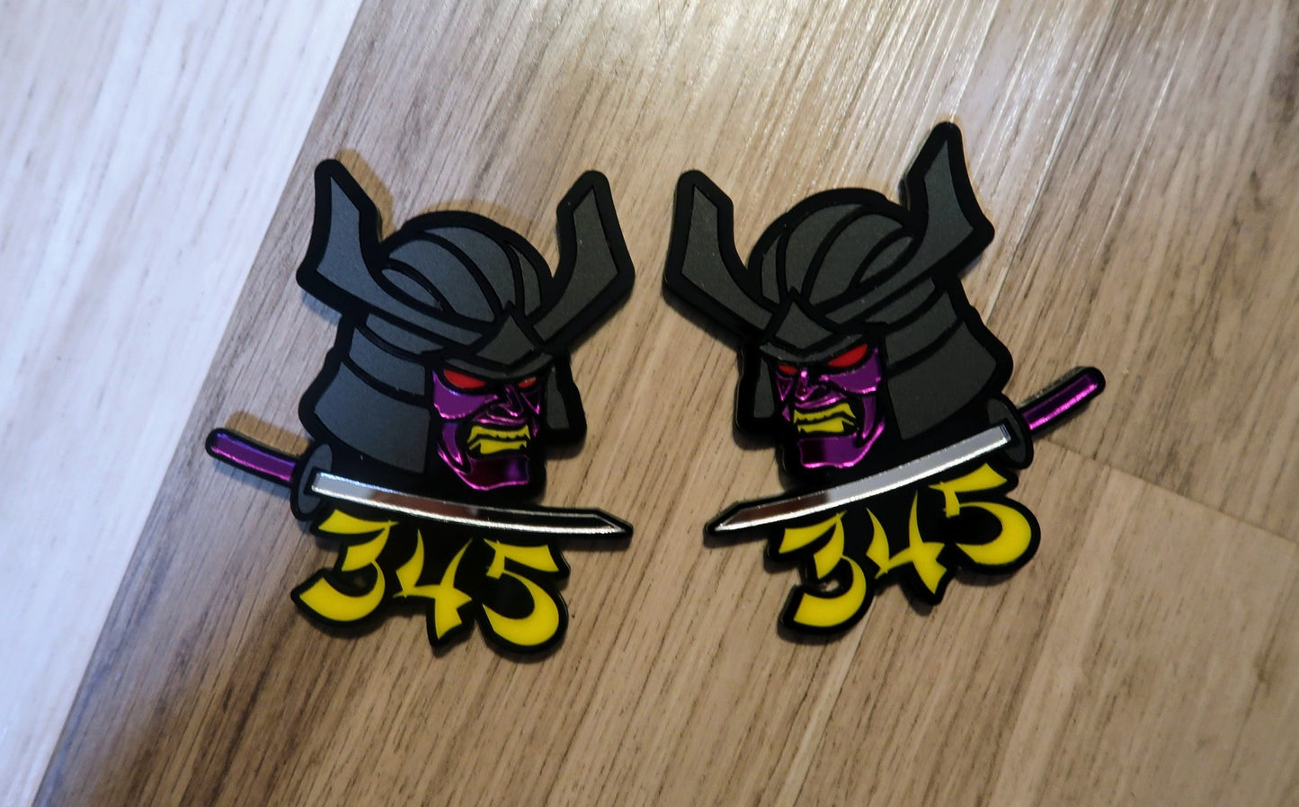 Samurai 345,392, 426 fender badges. Includes 2.