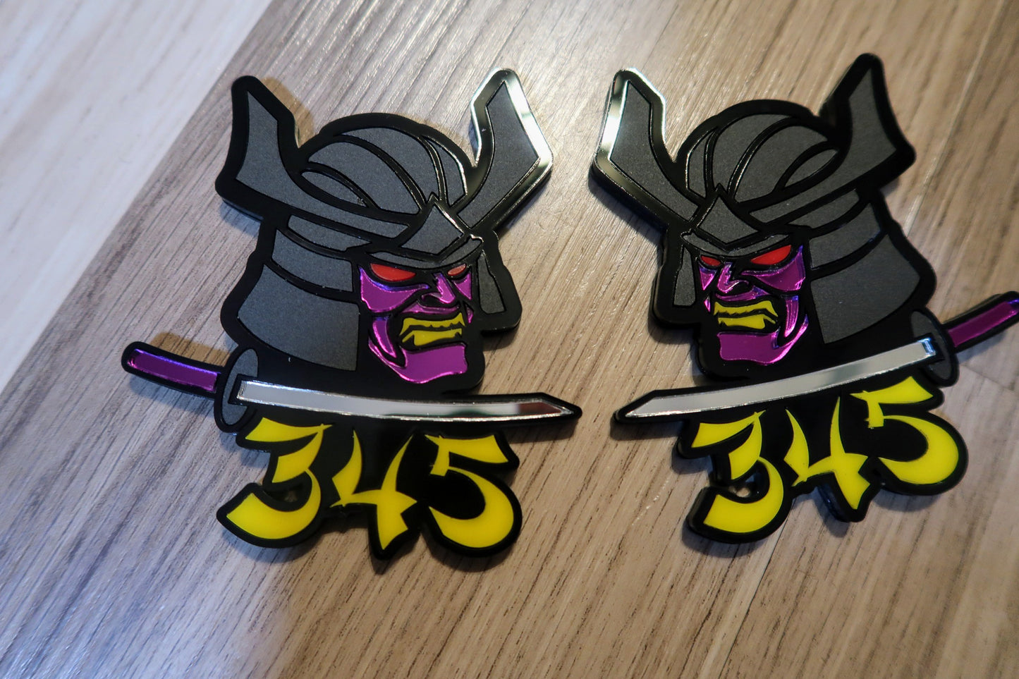 Samurai 345,392, 426 fender badges. Includes 2.