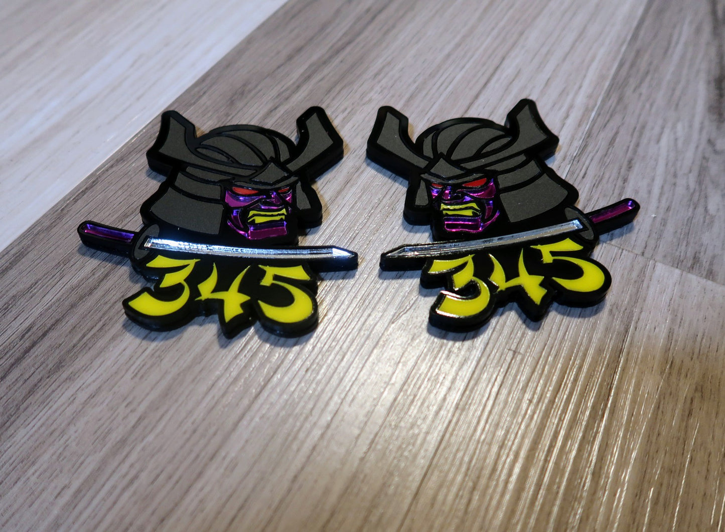 Samurai 345,392, 426 fender badges. Includes 2.