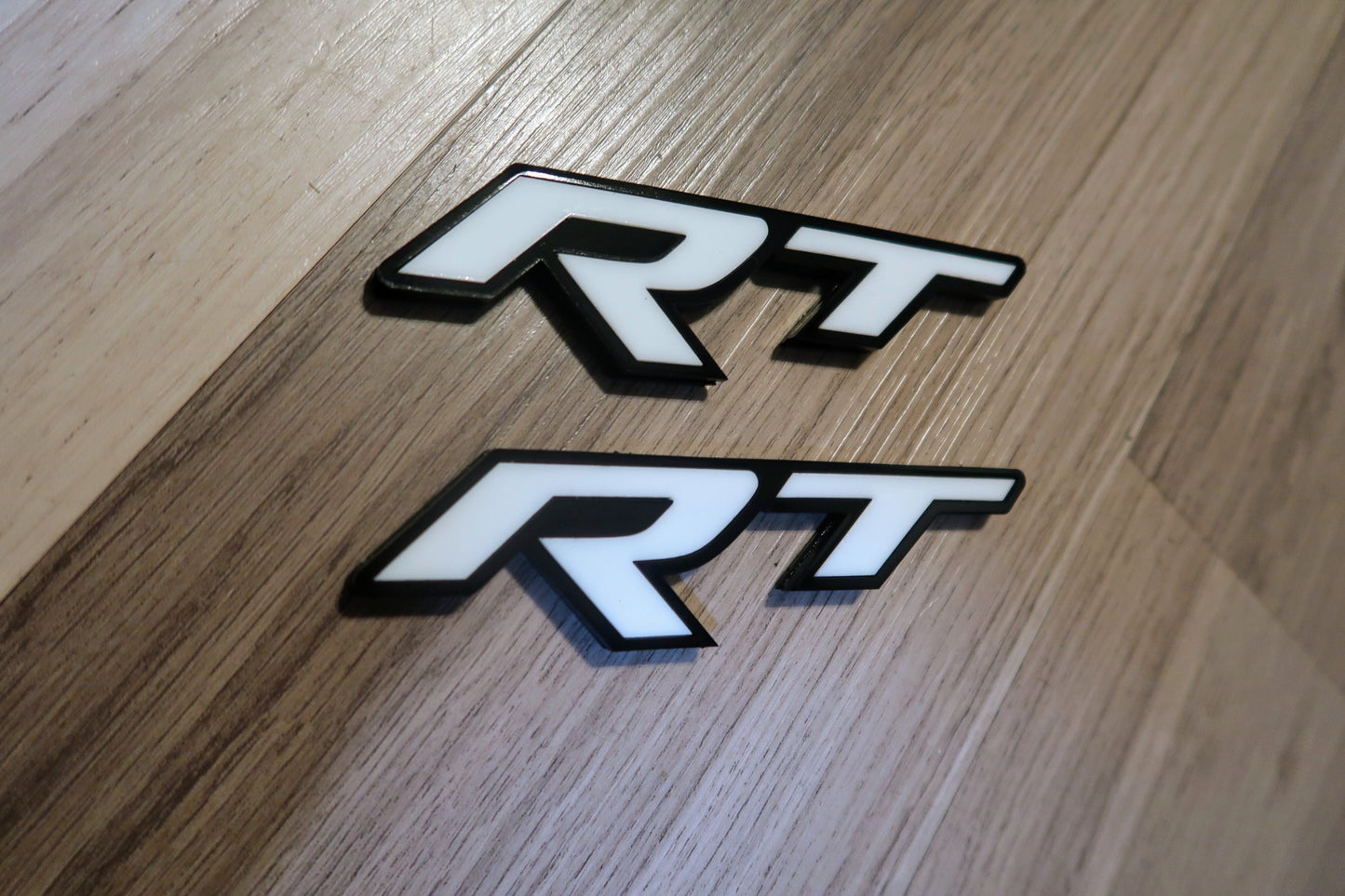 Racetrack badges. Includes 2.