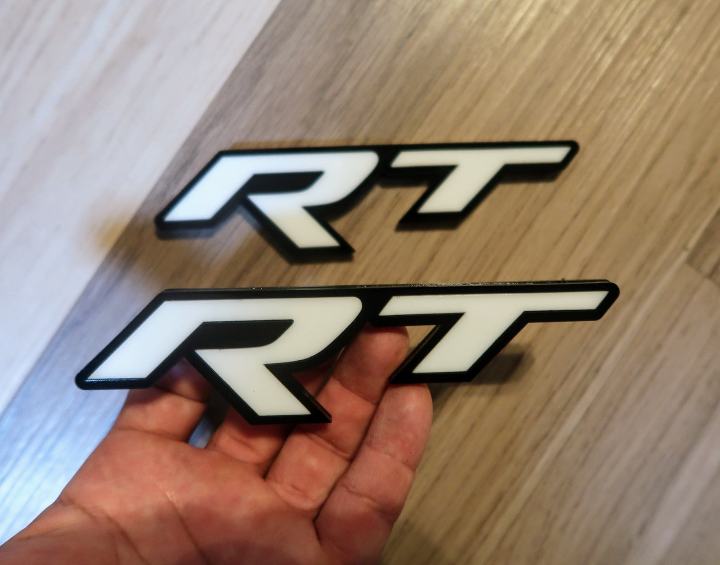 Racetrack badges. Includes 2.