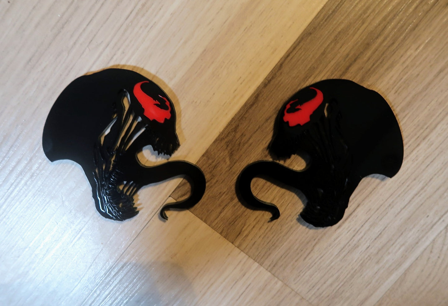 Inspired Carnage and Venom badges. Includes 2.