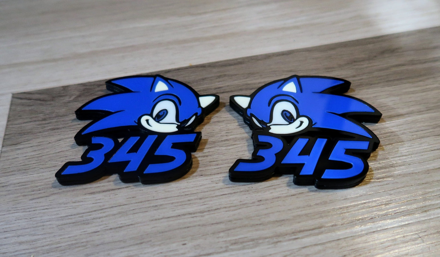Sonic 345, 392, 5.7, 6.4 fender badges. Includes 2.