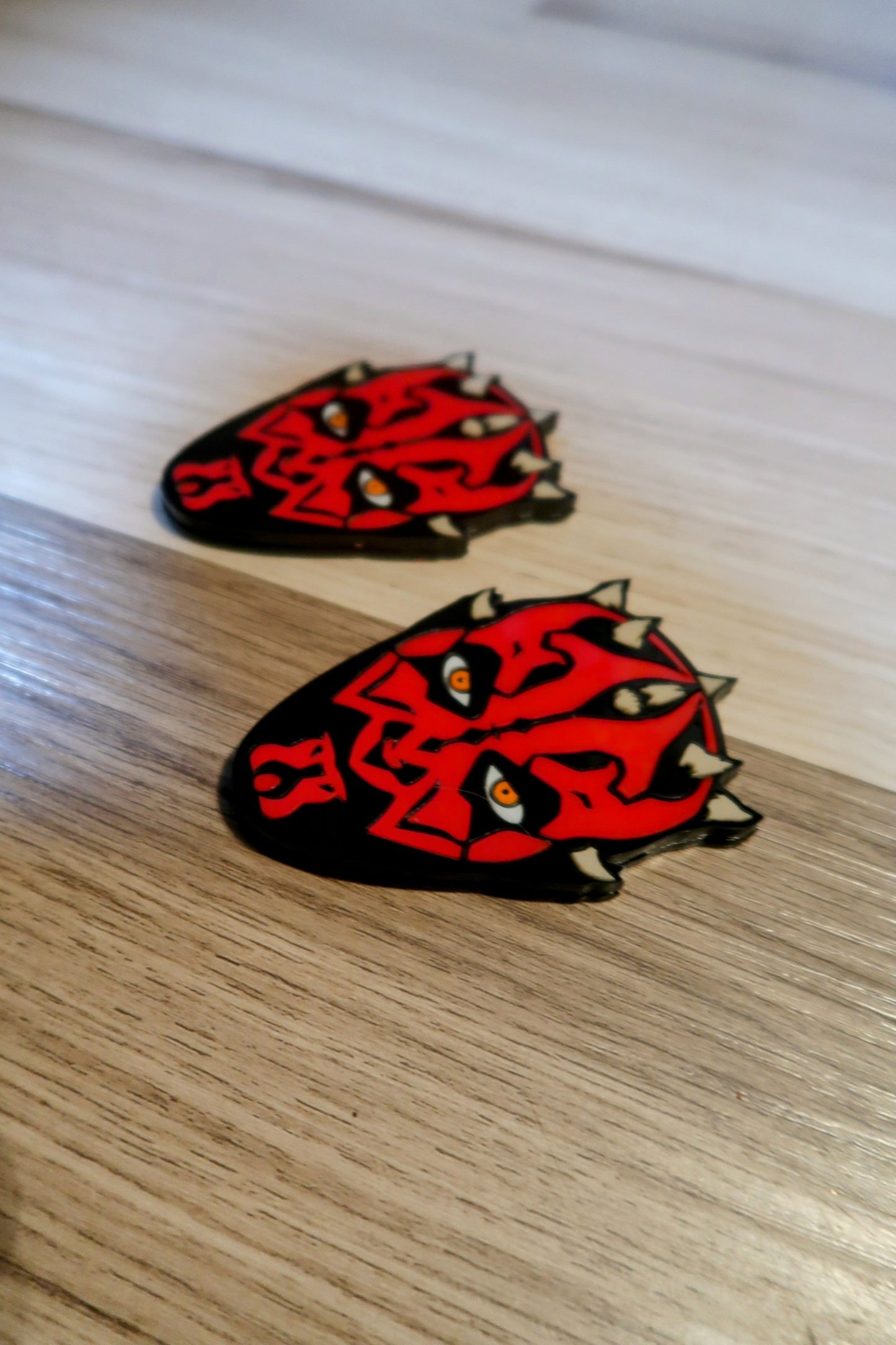 Darth Fender badges. Includes 2.