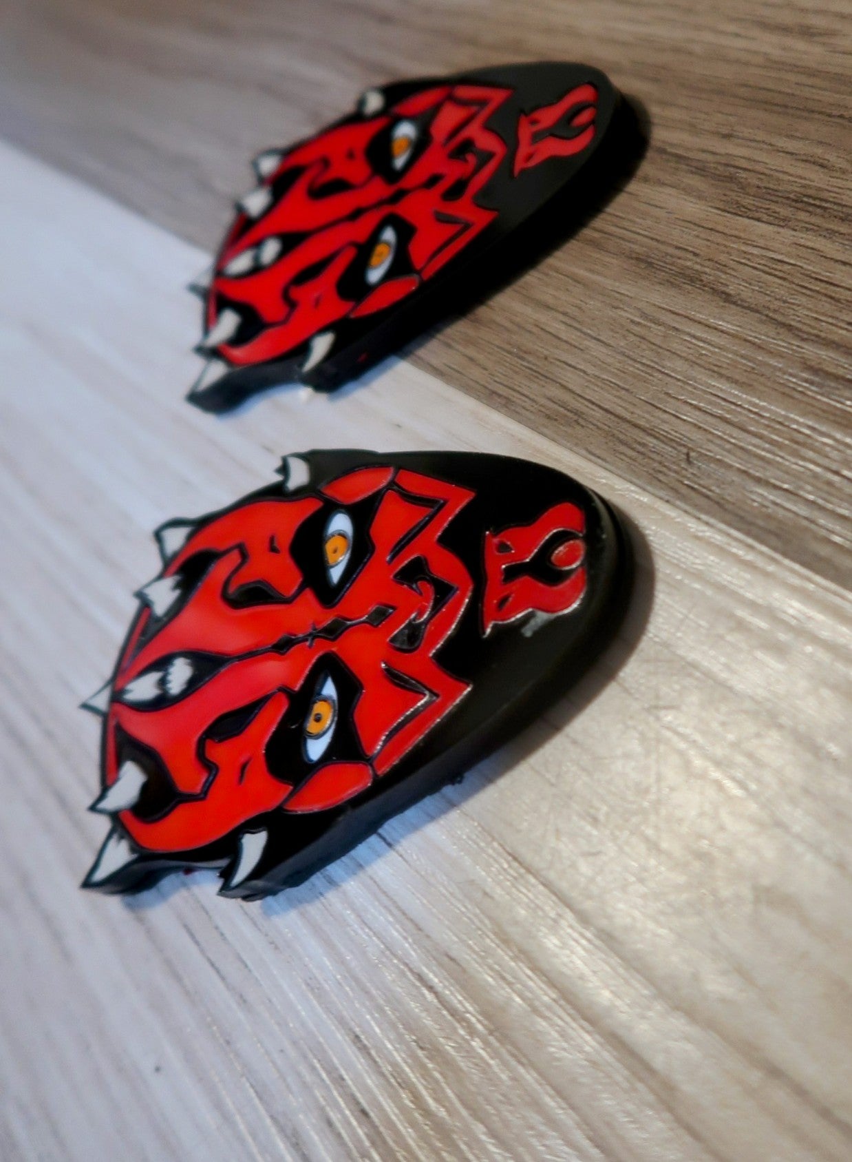 Darth Fender badges. Includes 2.