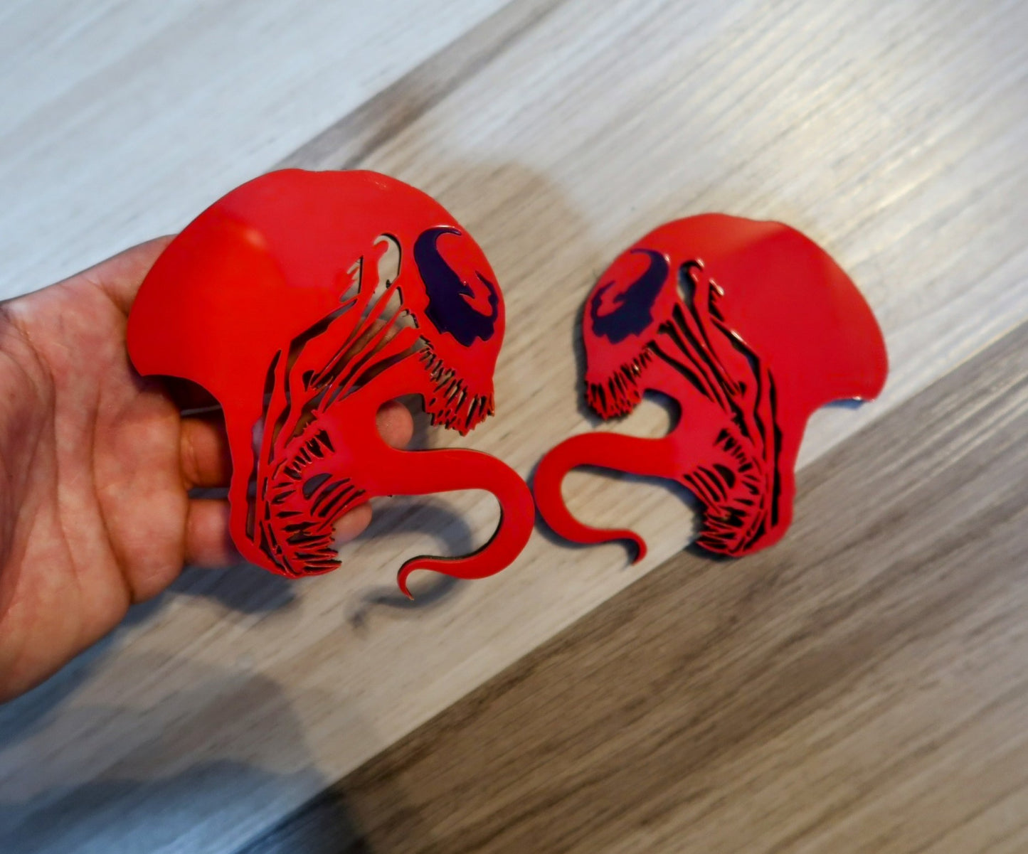 Inspired Carnage and Venom badges. Includes 2.
