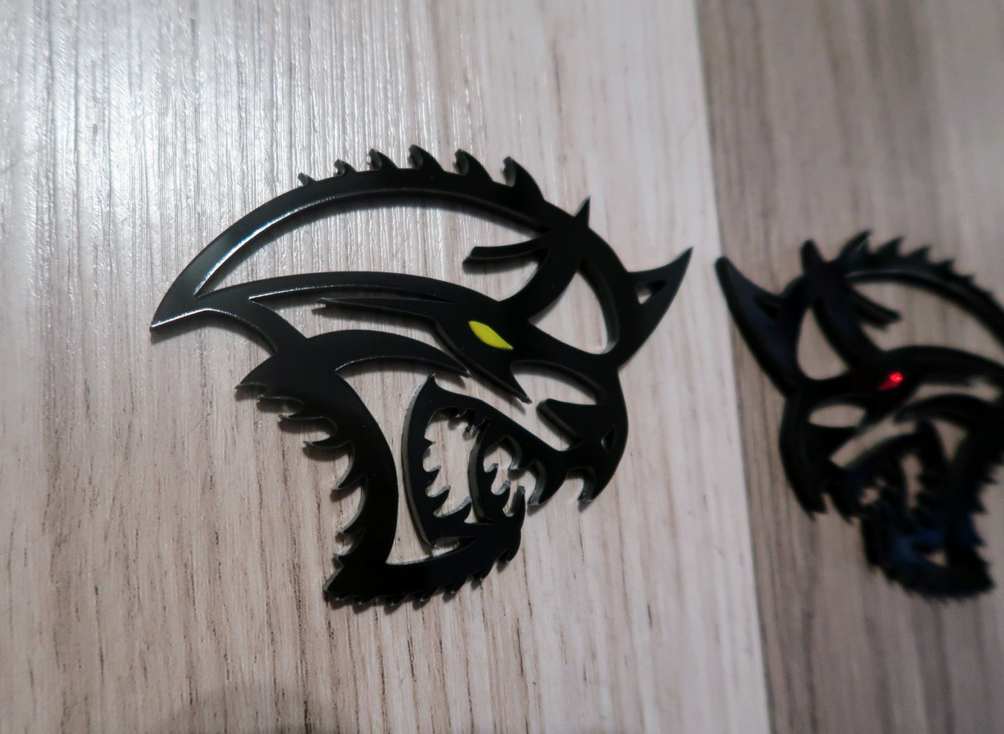 Cat from the Abyss badges. Includes 2.