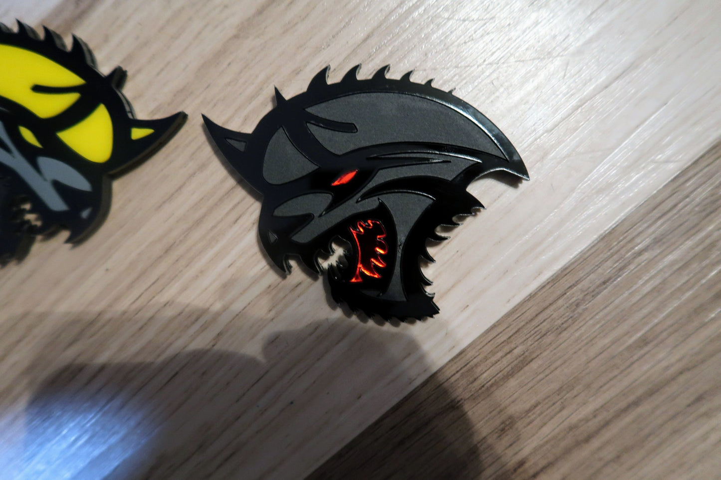 Cat from the Abyss badges. Includes 2.