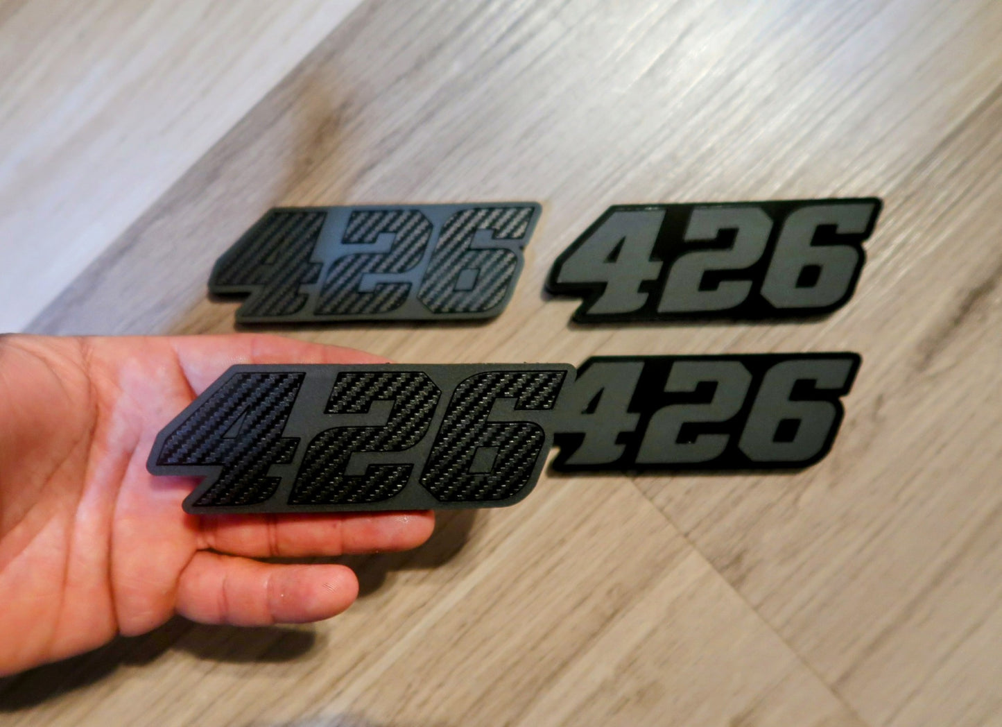 392, or 345, or 426 fender badges. Includes 2.
