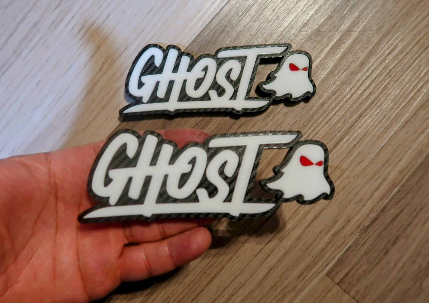 Ghost trunk and grill badge. Includes both.