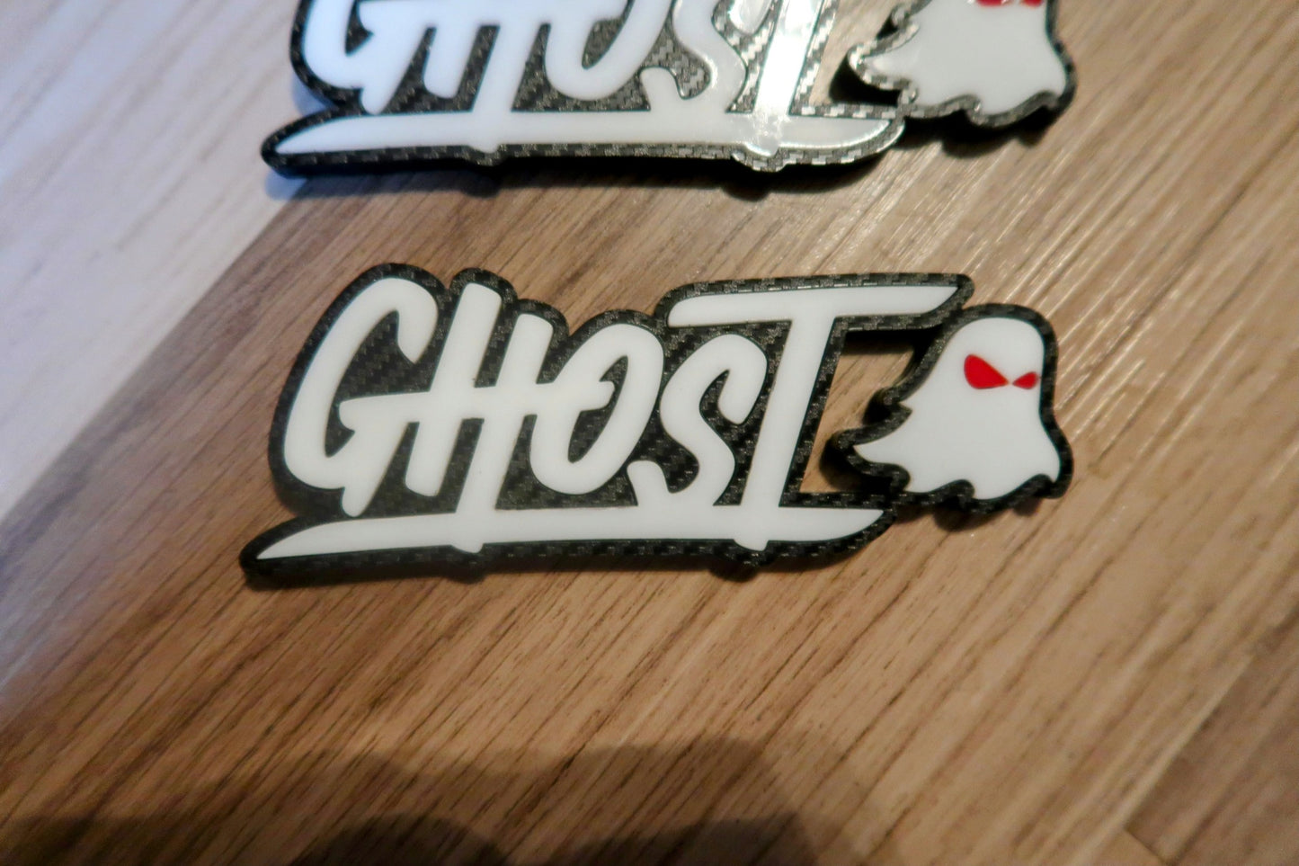 Ghost trunk and grill badge. Includes both.