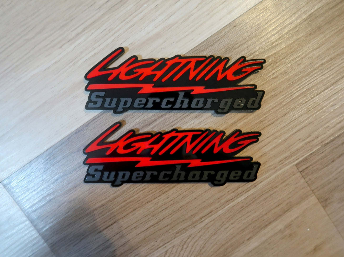 Supercharged Lightning badges. Included 2.