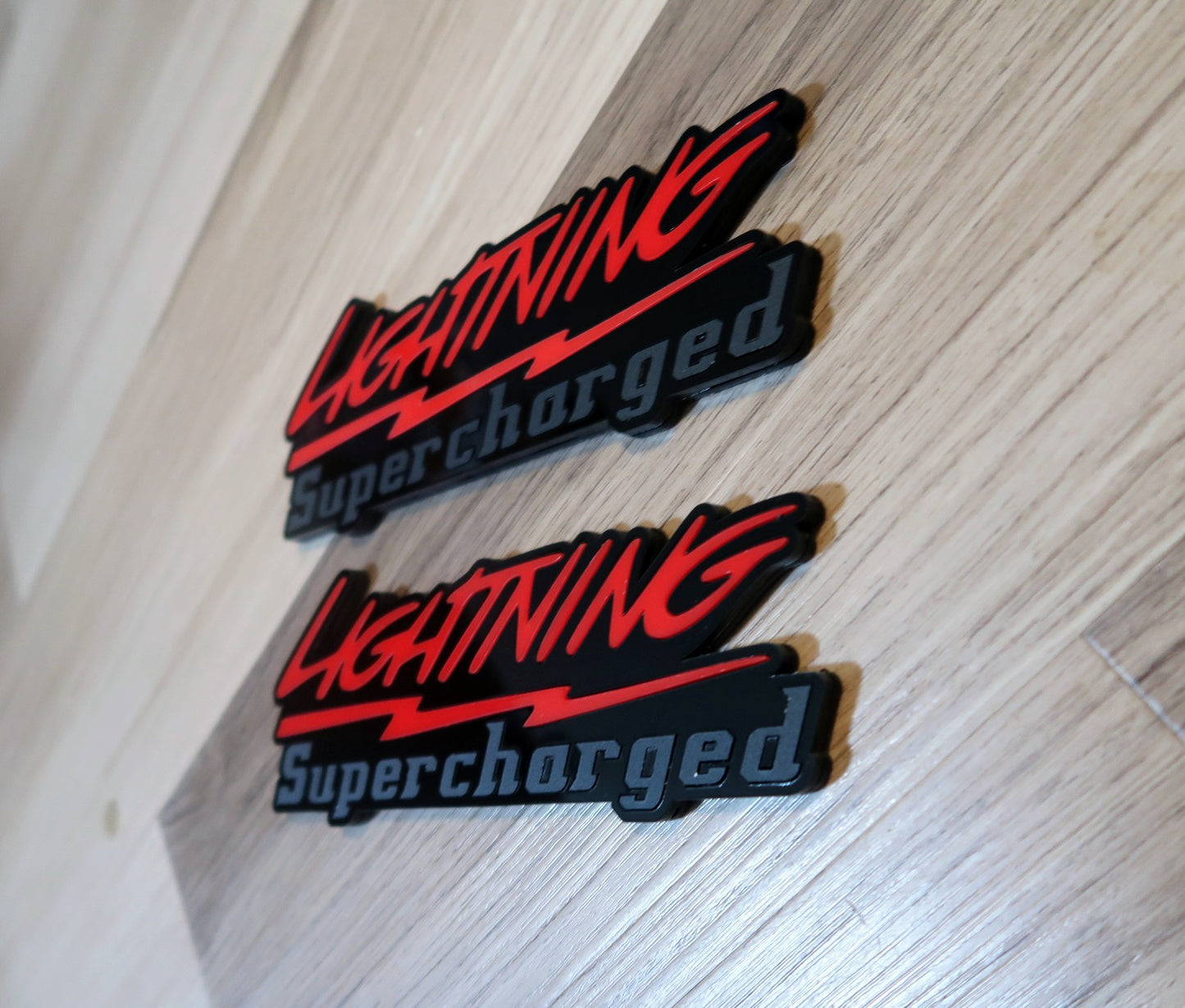 Supercharged Lightning badges. Included 2.