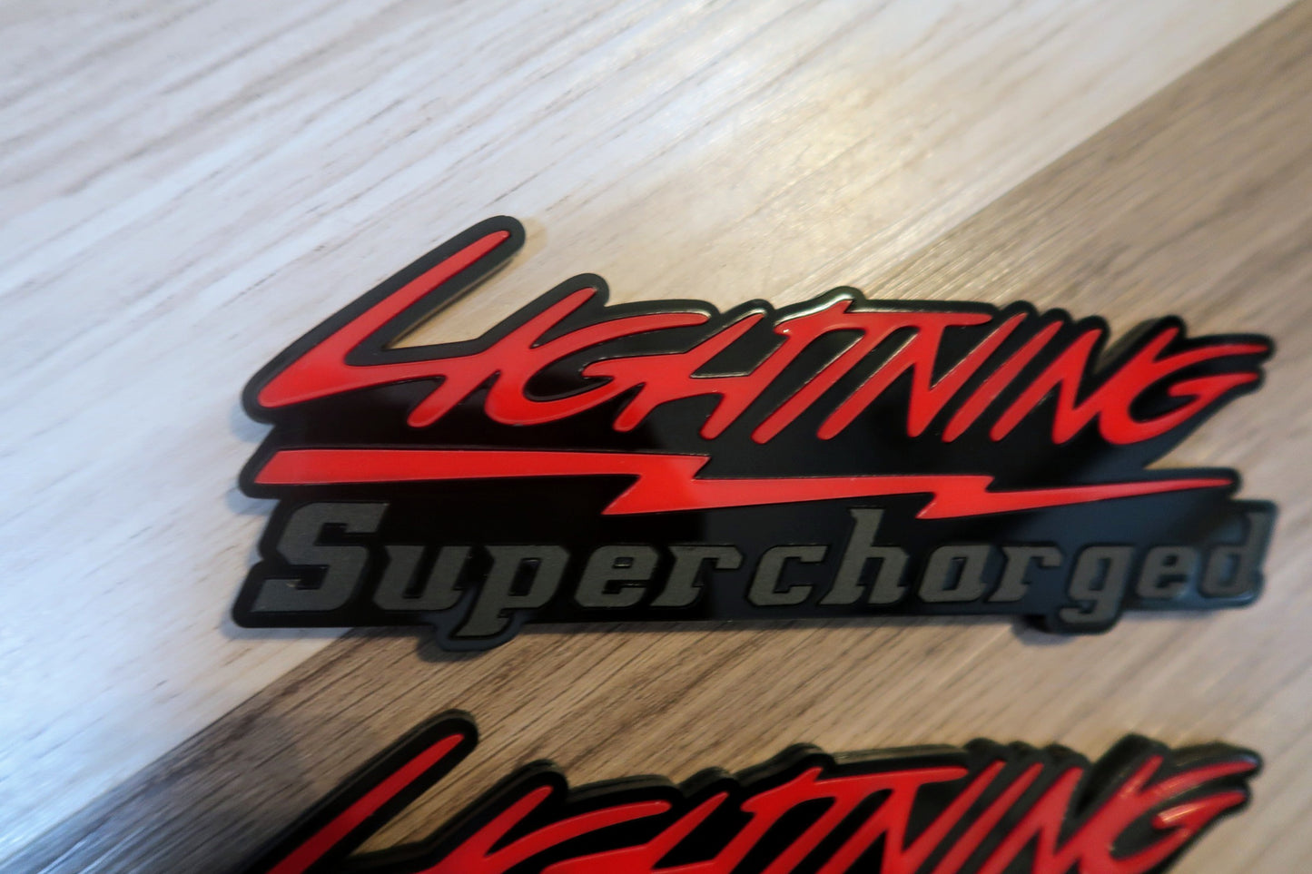 Supercharged Lightning badges. Included 2.