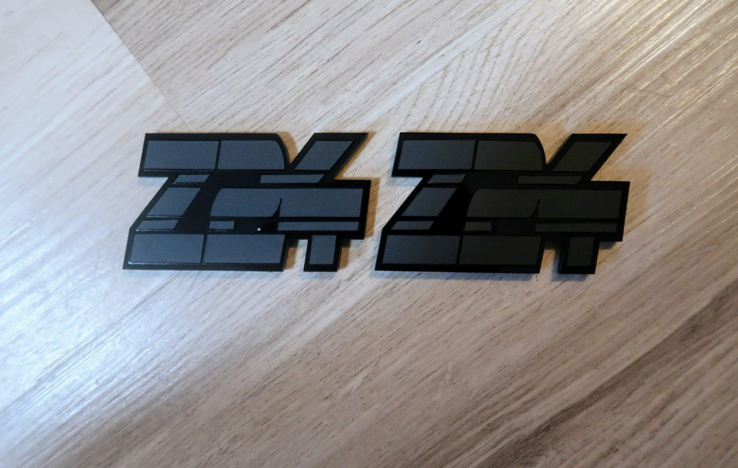 Z24 badges. Includes 2.