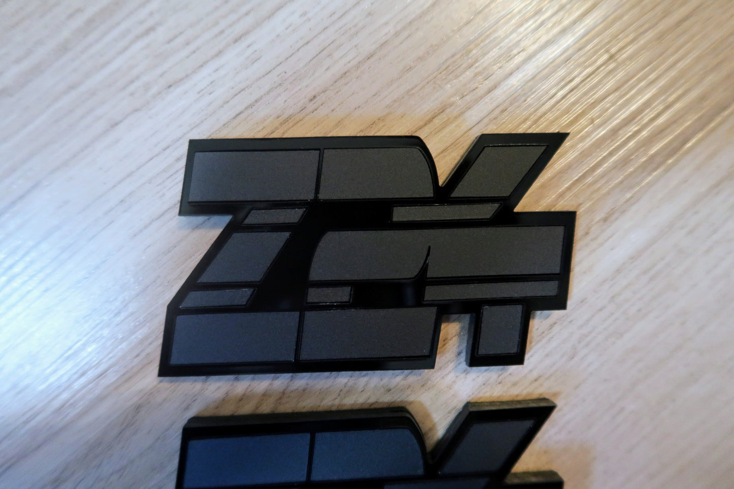 Z24 badges. Includes 2.