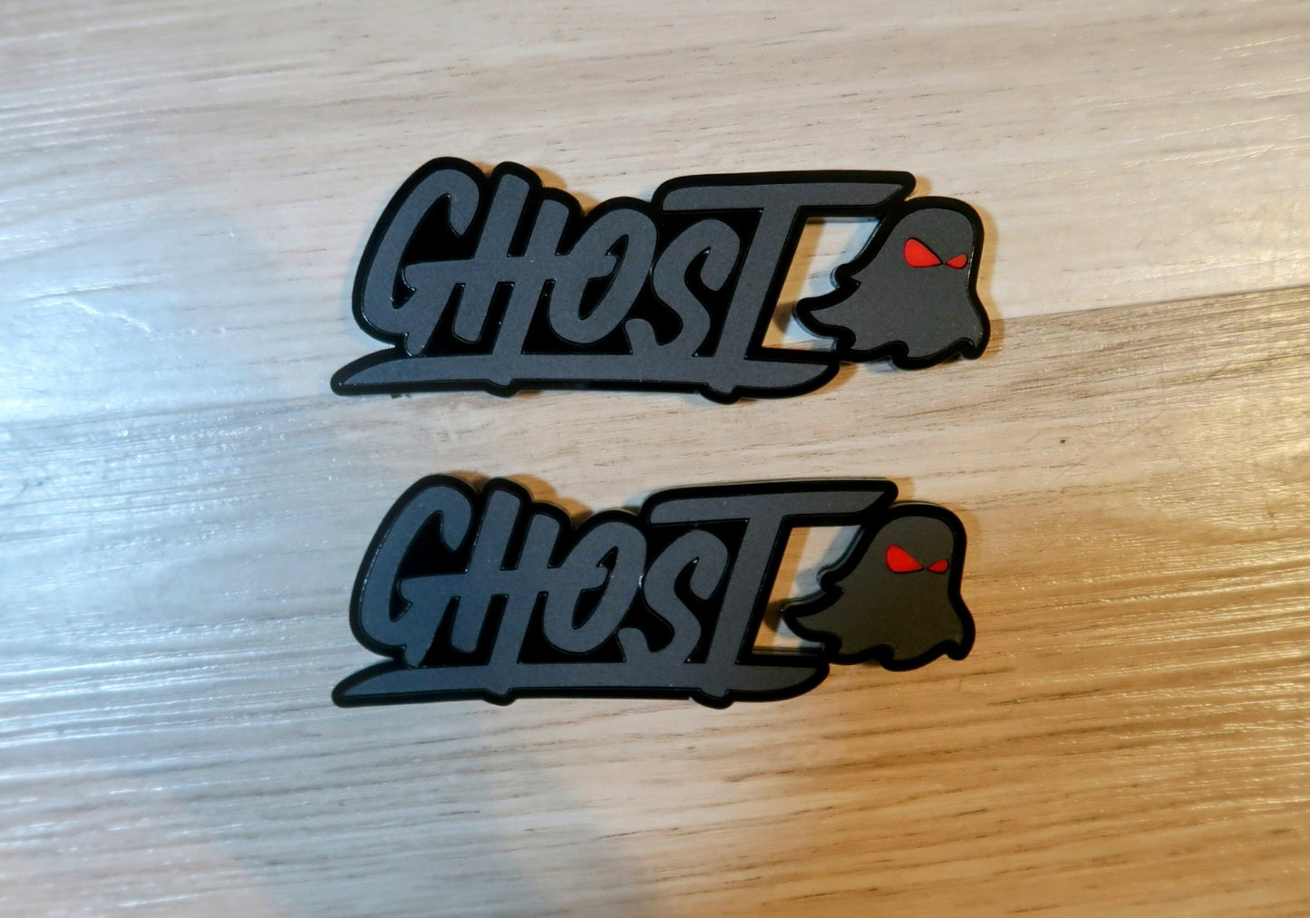 Ghost trunk and grill badge. Includes both.