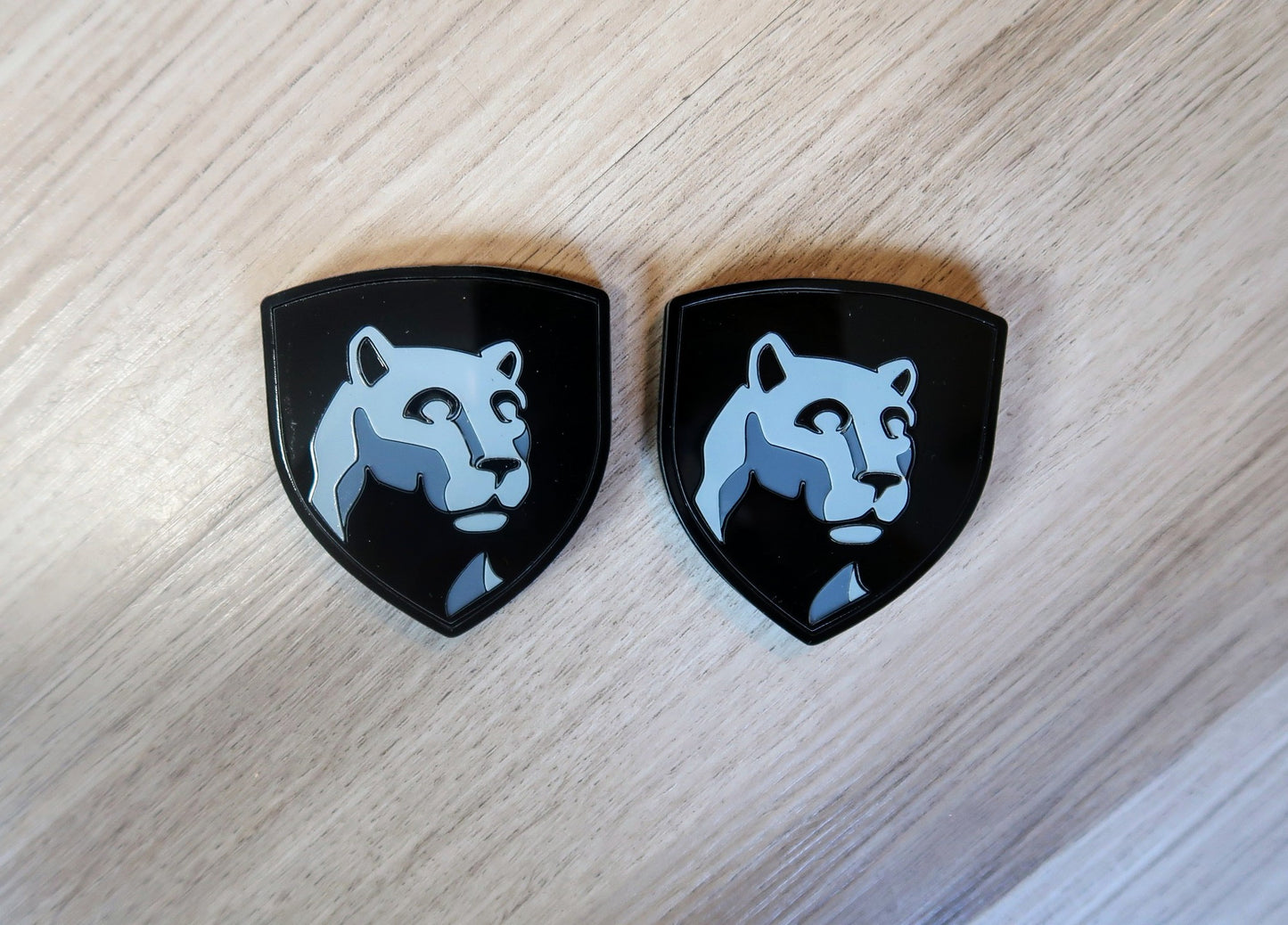 Puma badges. Includes 2.