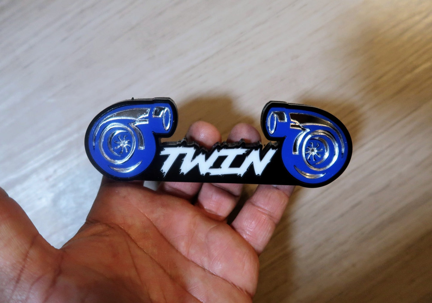 Twin Turbo badge. Includes 1.