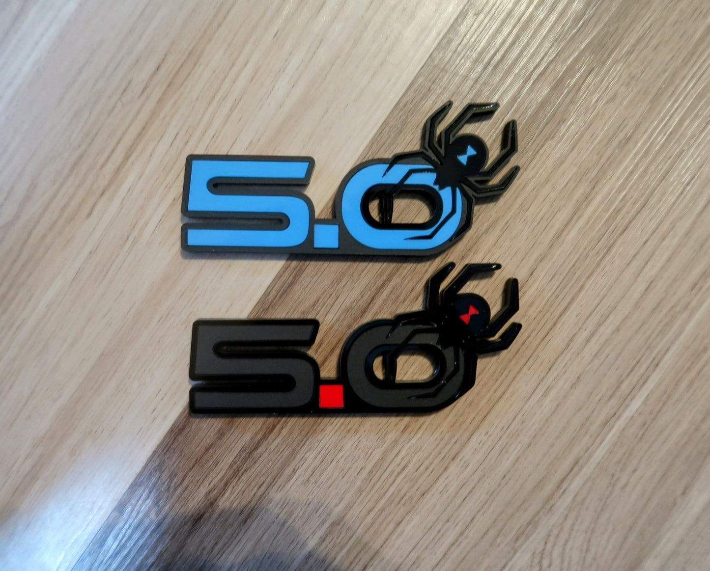 5.0 Spider badges. Includes 2.