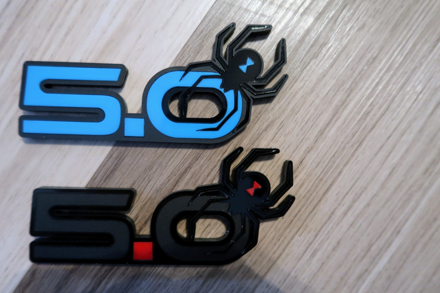 5.0 Spider badges. Includes 2.