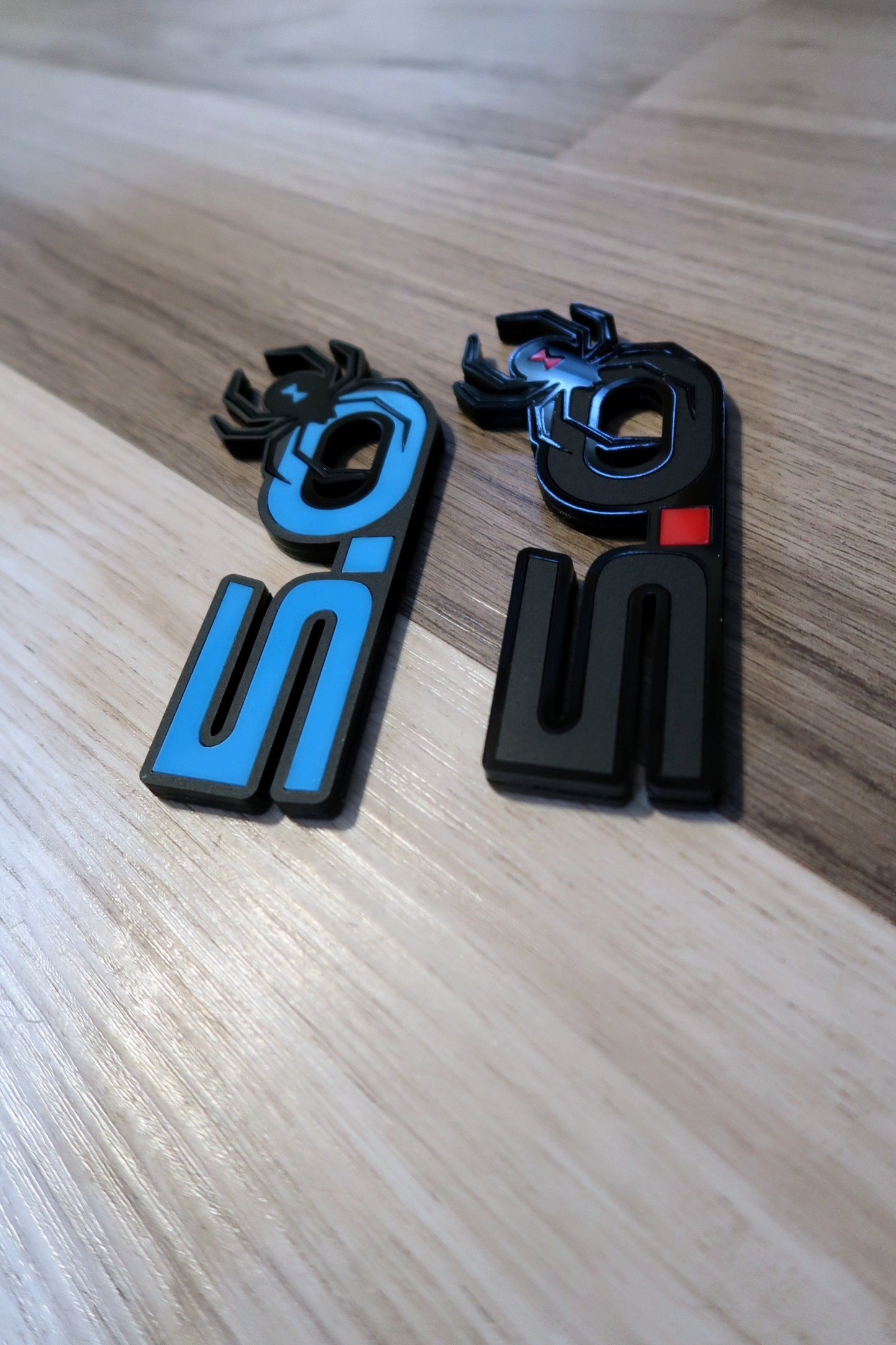 5.0 Spider badges. Includes 2.