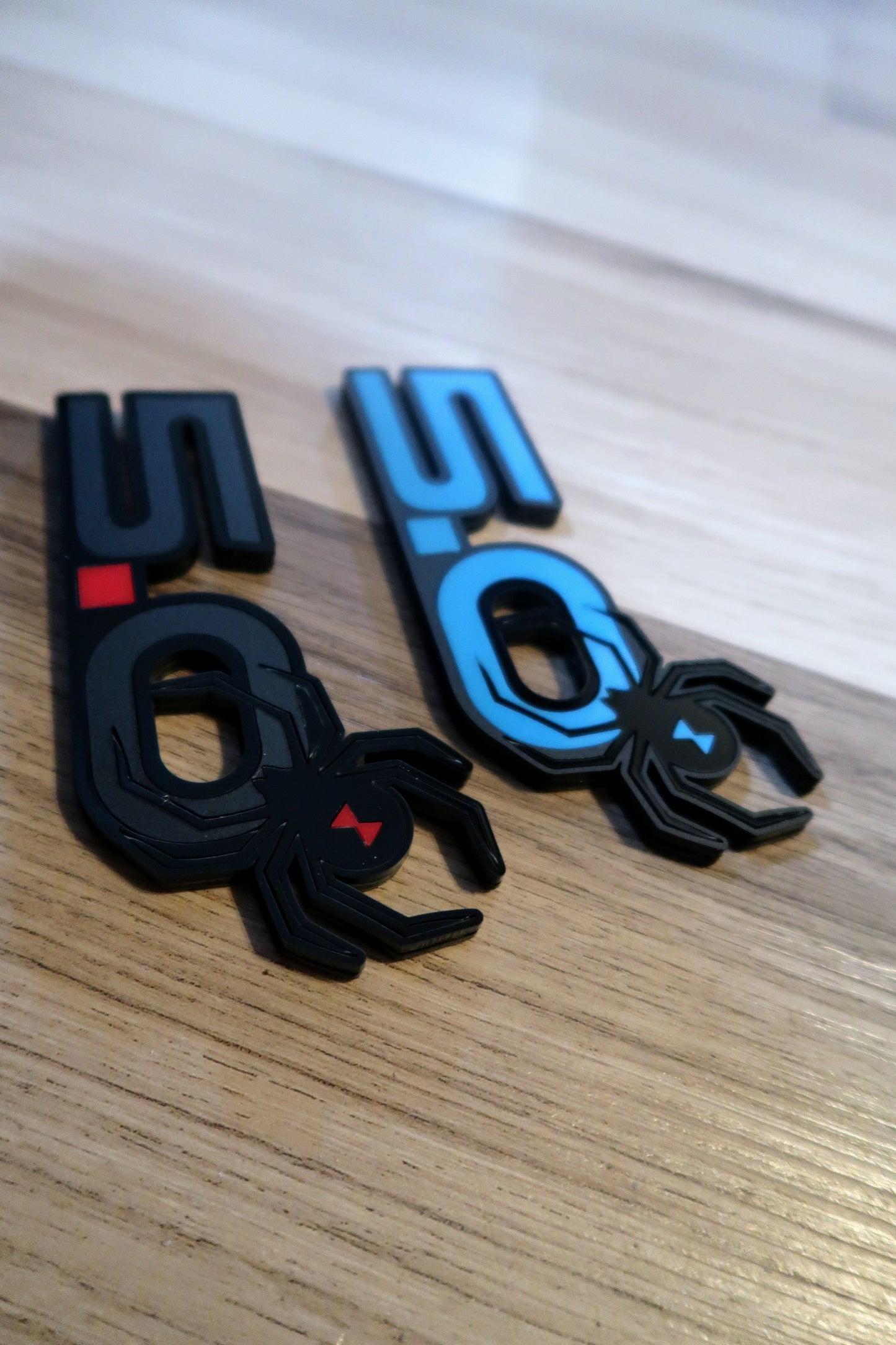 5.0 Spider badges. Includes 2.