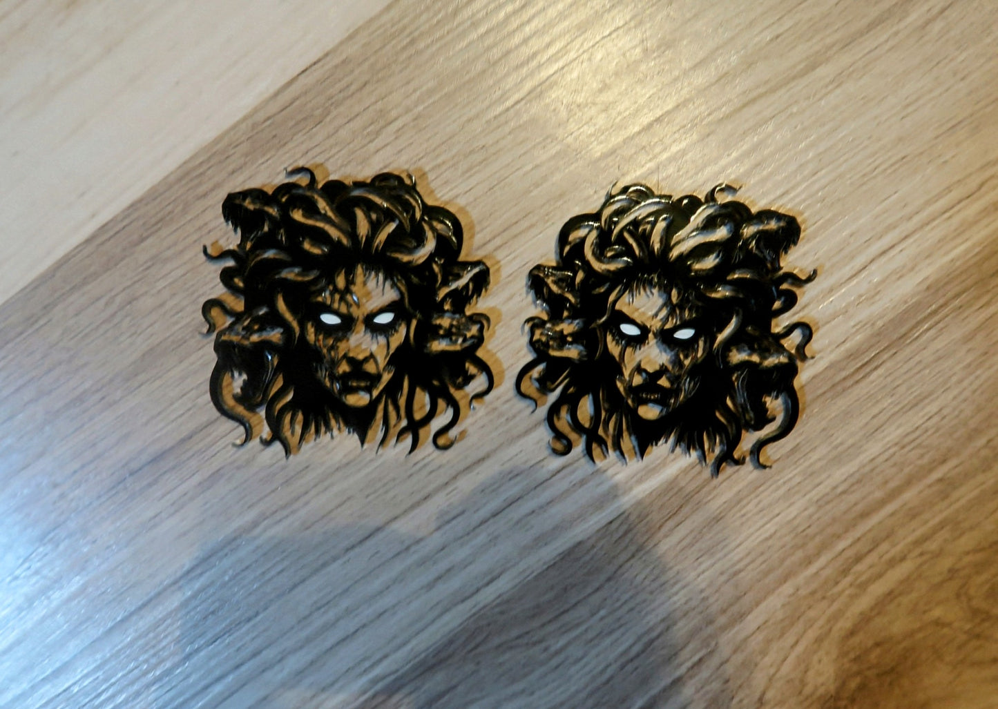 Medusa fender badges. Includes 2.
