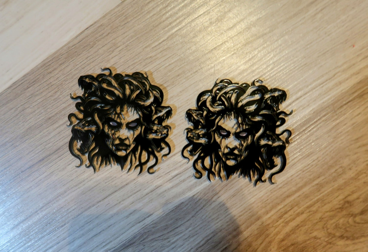 Medusa fender badges. Includes 2.