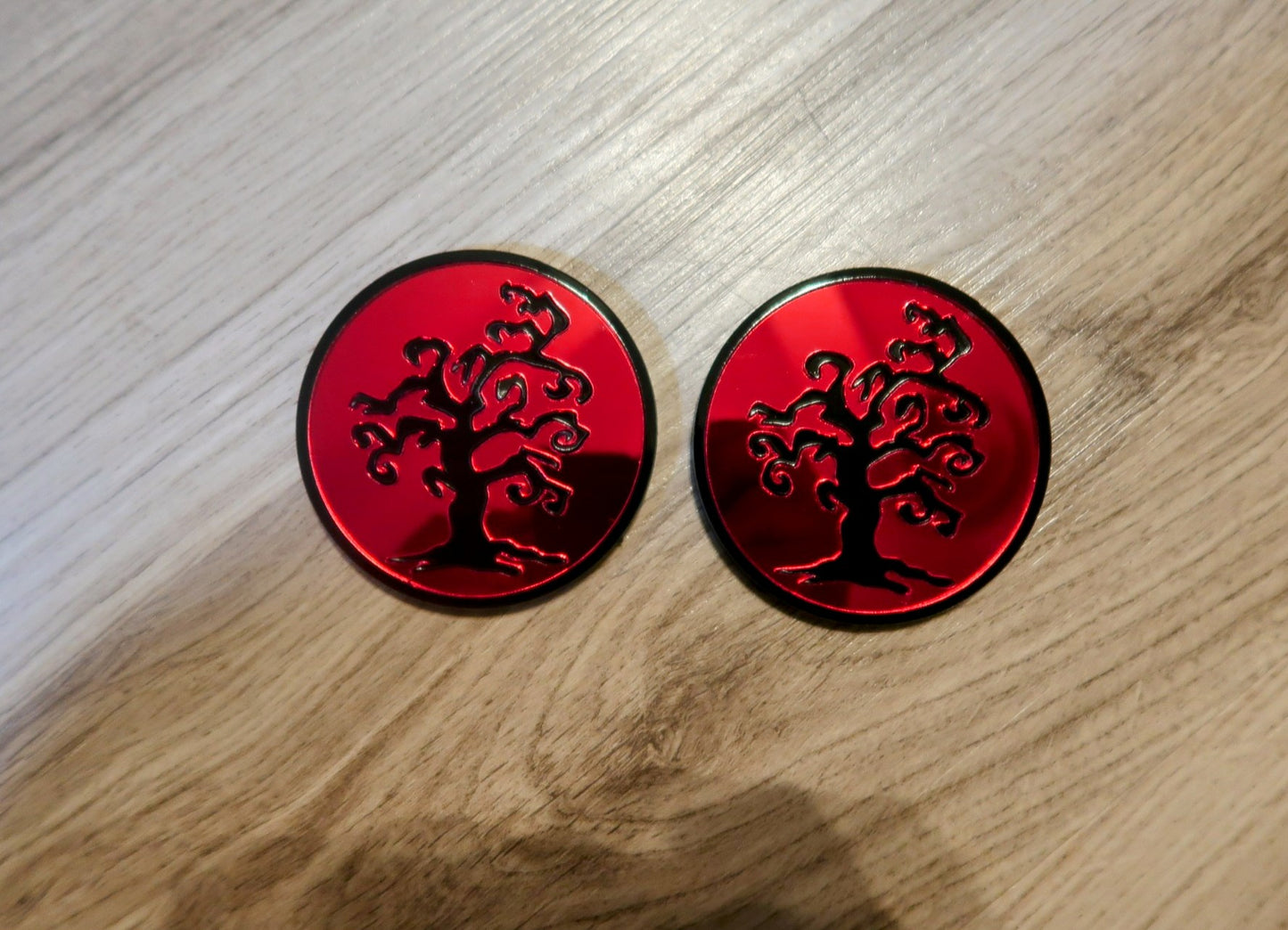 The Creepy Tree badges. Includes 2.