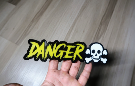 Danger/Skull car badge