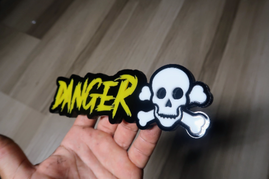 Danger/Skull car badge