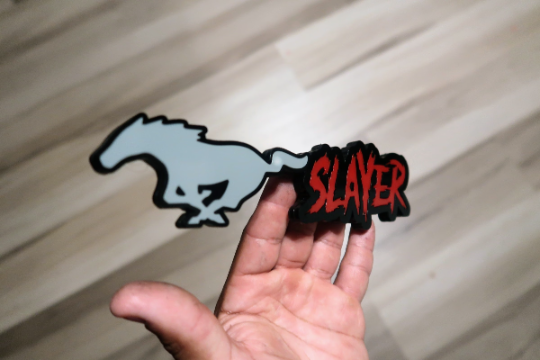 Mustang slayer badge