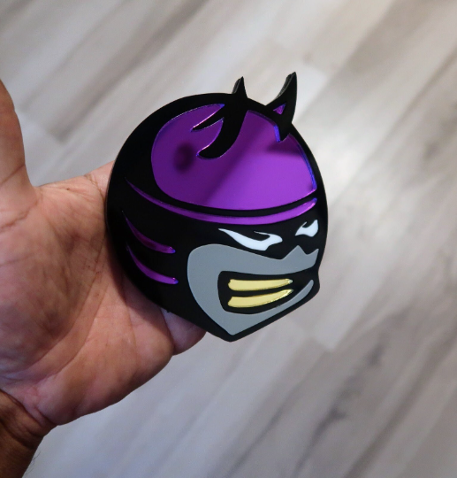 Single 5 color cutomize-able bee head badge.